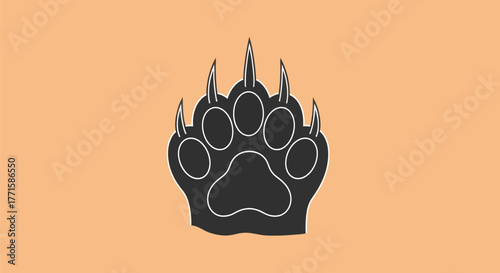 A stark black bear paw print with white outline and claws set against a peach background