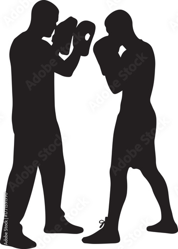 Silhouetted boxers sparring intensely during a boxing training session demonstrating a powerful combat sport