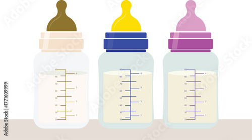 Three Baby Bottles With Different Colored Nipples And Liquid Levels milk formula