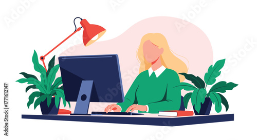 Young blonde woman working at her computer in a home office setup with plants and a desk lamp.