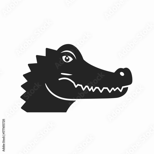 A stylized black silhouette of an alligator's head, showing detailed features and sharp teeth.