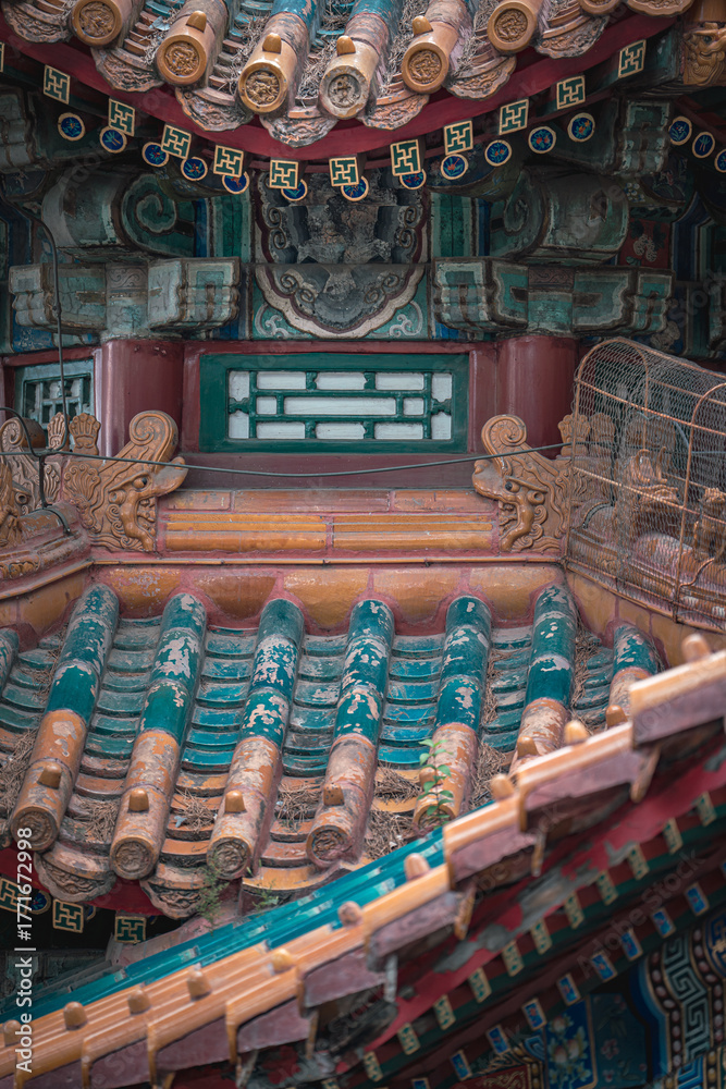 Fototapeta premium Close up of Summer Palace building details in Beijing, China. This ancient architecture showcases intricate artistry. The colors and shapes are vibrant.