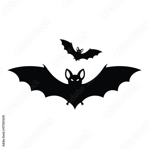 Two silhouettes of bats flying two silhouettes of bats flying one larger bat in foreground with smaller bat overhead suitable for halloween themes and spooky decorations silhouette