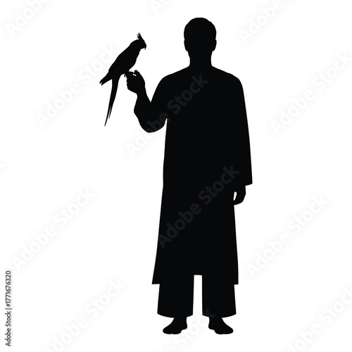 Silhouette of a person in traditional garb holding a bird of prey symbolizing heritage and nature silhouette