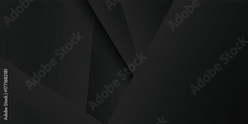 Minimalist abstract background of layered black paper creating geometric shapes and soft shadows.