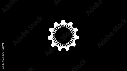 Abstract white cogwheel or gear symbol isolated on a stark black background representing mechanics and industry