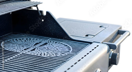 Frost on outdoor grill showing metal grill and clean surface  