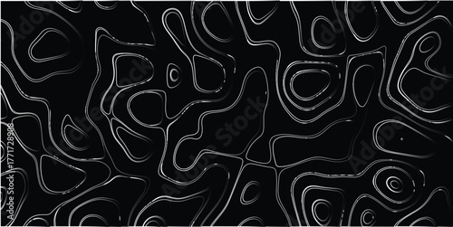 Abstract topographic map contour lines in grayscale with a dark background creating a sense of depth and organic patterns