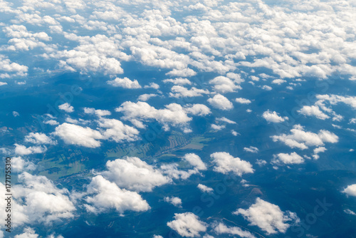 Foto Aerial view of fluffy white clouds over landscape