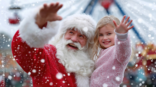 Joyful caucasian elderly santa claus with smiling caucasian child in snowy wonderland