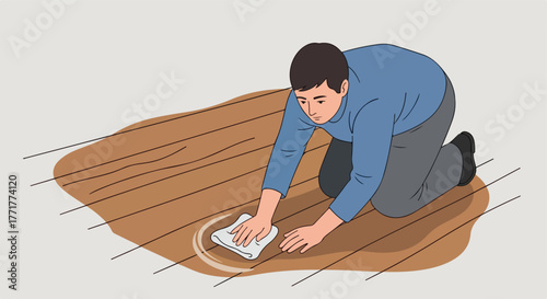 Person cleaning spilled liquid on wooden floor