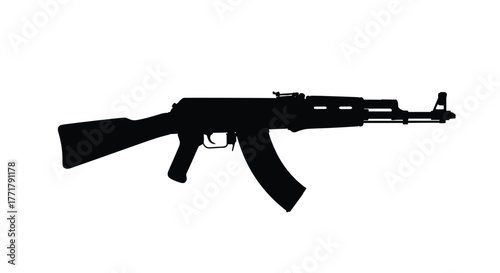 Silhouette of an AK-47 assault rifle on a white background, representing military weaponry and conflict themes.