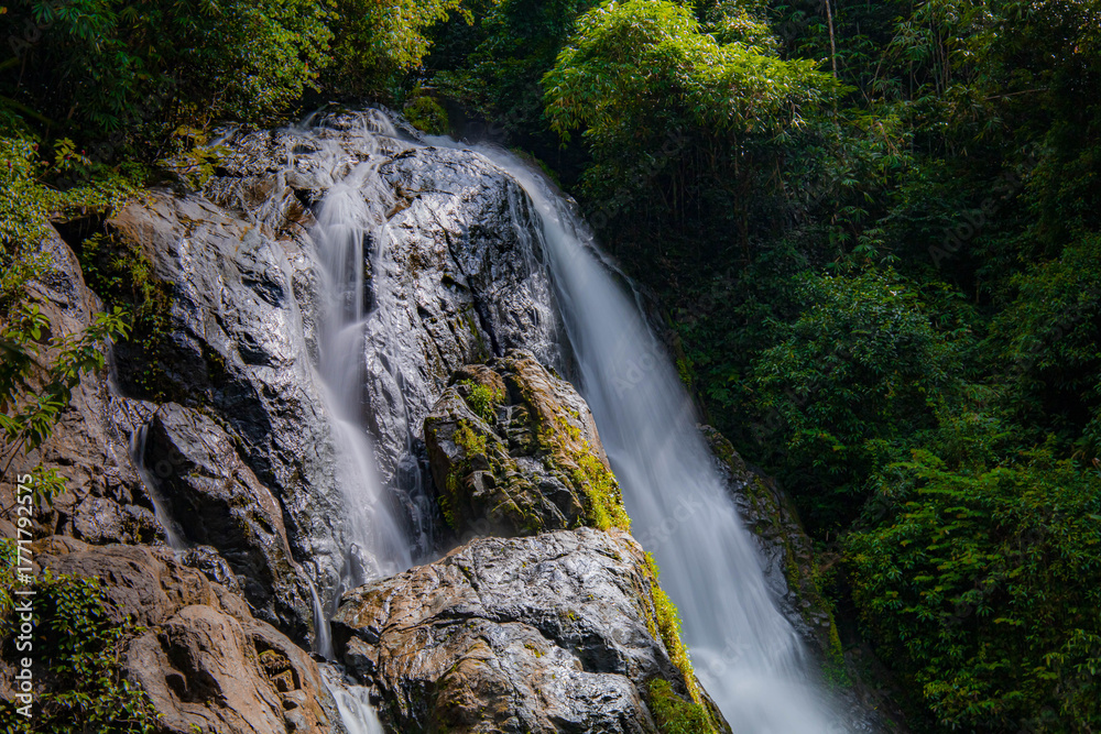 Fototapeta premium A gorgeous waterfall captured in long exposure, Punjaban Waterfall, national park, Ranong, Thailand.