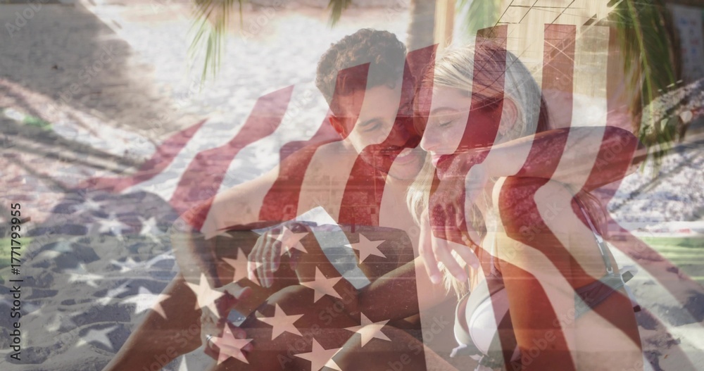 Naklejka premium Couple examining folded map on beach mat on sand under tropical palm frond canopy, with sunglasses