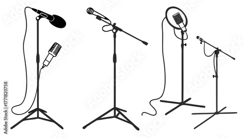 Microphone stands with various microphone types in a studio setting for recording and broadcasting