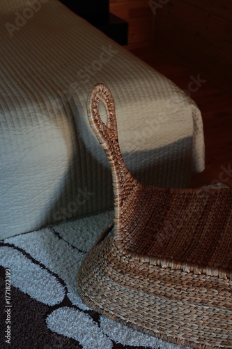 wicker basket on a bed