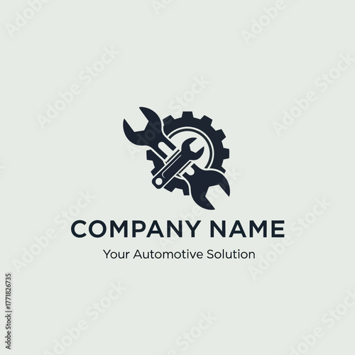 Automotive Repair Logo Featuring Wrenches and Gear.