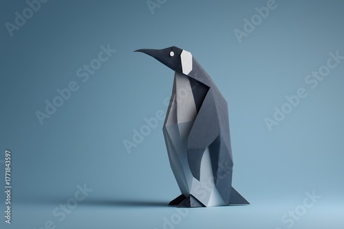 Geometric Penguin Sculpture on Blue Background for Creative Design