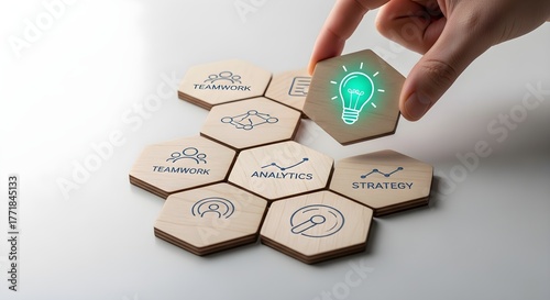 Innovative business solutions concept with glowing idea hexagon and connecting teamwork elements.