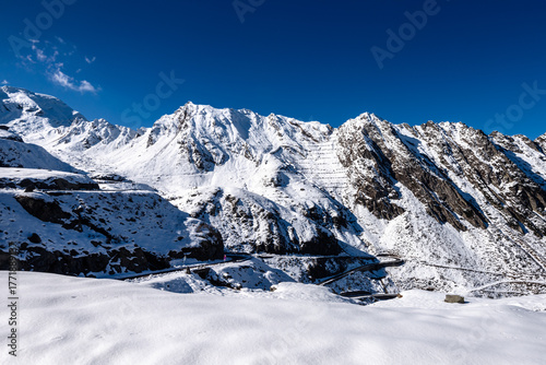 View of the Snow  Transfagarasan Highway Mountain Road in sunny day, Carpathians, Romania