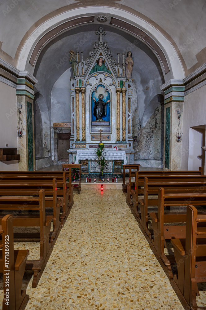Fototapeta premium Villalago, Hermitage of San Domenico. Built near the lake of San Domenico in the 11th century, as a votive chapel in a natural cave considered sacred.