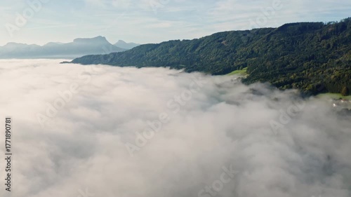 Peaceful Fog Over Lake Irrsee, Austria – 4K Aerial Drone Footage of Misty Hills and Mountains in Daylight
