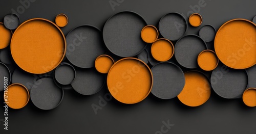 Collection of black and orange circles arranged in a way that creates a sense of movement and depth