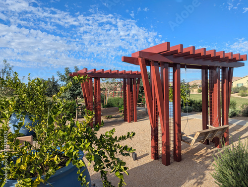 Wallpaper Mural A pair of tandem swings under pergolas at a public park Torontodigital.ca