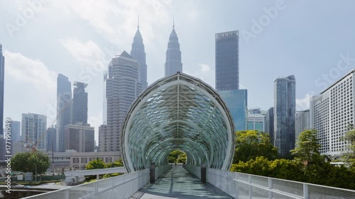 Kuala Lumpur skyline from pedestrian bridge across the Klang River