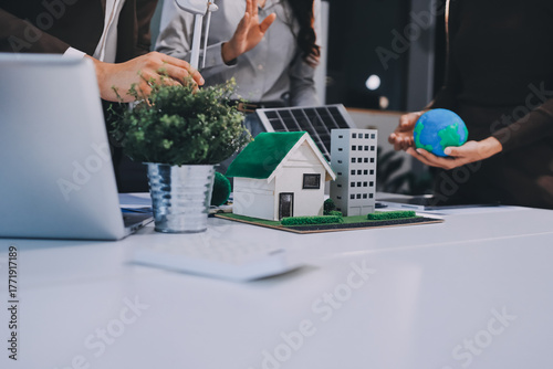Group of businesspeople in team brainstorm meeting discussion on ESG (Environmental, social, corporate governance) organization planning. Sustainable business, coworker people teamwork. Close up