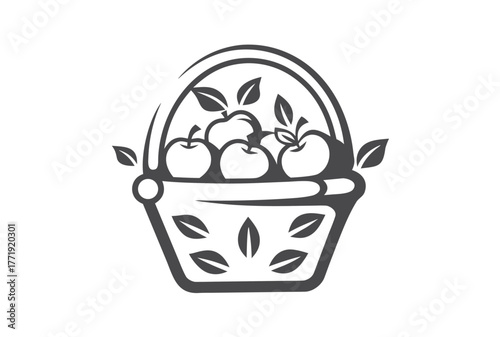 Line of a basket filled with apples and leaves displays simplicity beautifully