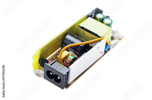 Damaged power supply board with swollen capacitor and electronic components