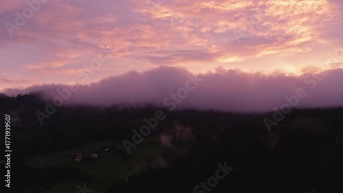 Mystical Fog and Clouds Rolling Over Austrian Mountains – 4K Aerial Drone Footage in Autumn at Sunset