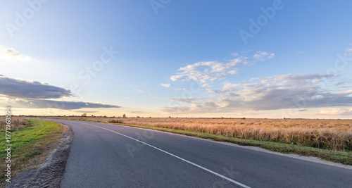 Wallpaper Mural Long road with a clear blue sky above it Torontodigital.ca