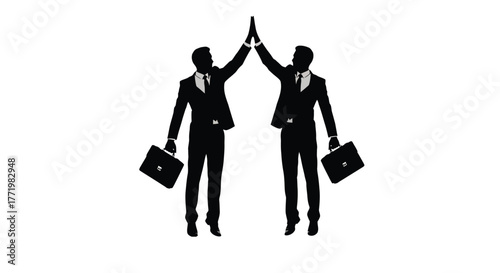 Two businessmen celebrating success with a high five dark silhouette