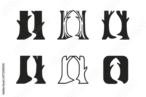 Forest Shortcut Logos. Forest shortcut. Set Logo of Forest shortcut: tree trunks forming opening. harmonious logo variations of the same emblematic concept,