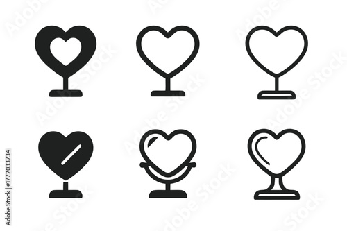 Heart-Shaped Mirror Logos. vanity mirror. Set Logo of vanity mirror: Heart-shaped vanity mirror. Icon set. harmonious logo variations of the same emblematic