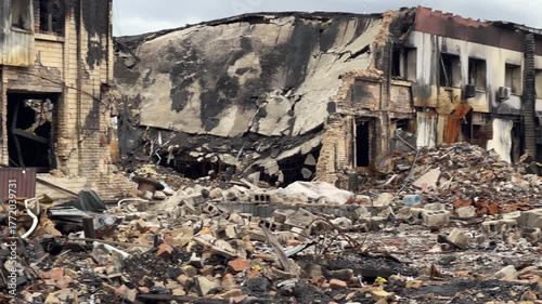 War in Ukraine: Destroyed industrial building in Kyiv, several months after a Russian missile or drone attack, with piles of rubble. October 2025