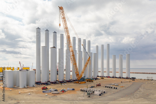 Towers of Huge Wind Power Turbines Under Construction in the Harbor of Ronne, Bornholm, Denmark