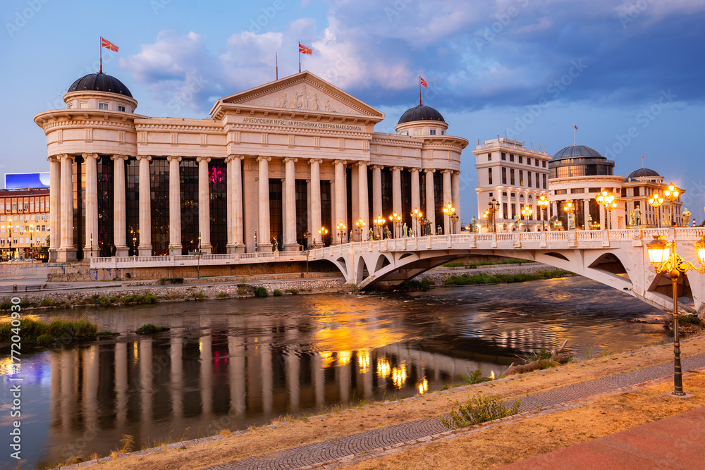 Fototapeta premium Evening view of the building of the Archaeological Museum of the Republic of Macedonia. Beautiful scenery of the night city of Skopje