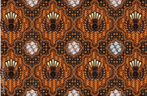 Batik Indonesian: is a technique of wax-resist dyeing applied to whole cloth, or cloth made using this technique originated from Indonesia.