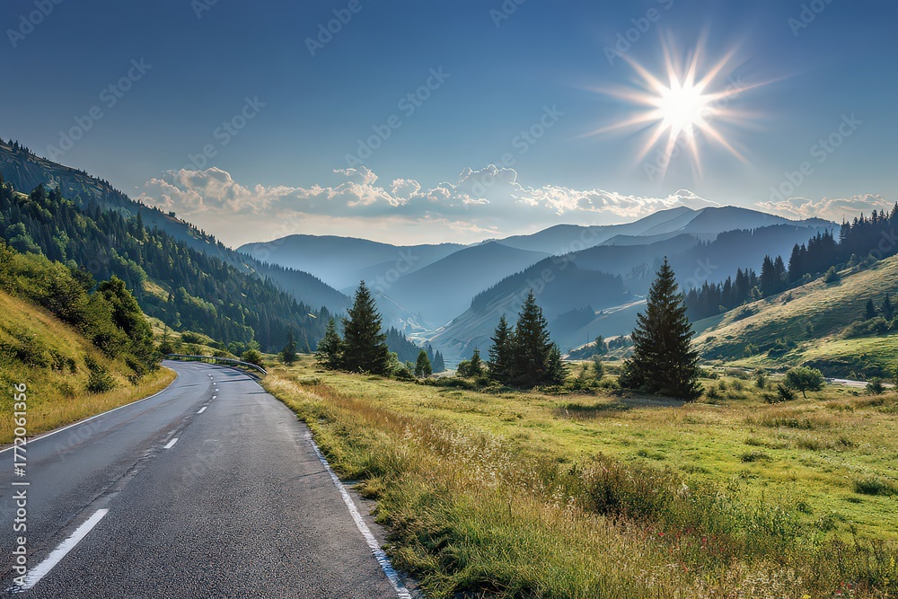 Naklejka premium Mountain Road Under Bright Sunlight With Lush Green Forest and Blue Sky