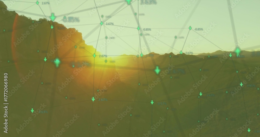 Obraz premium Displaying network graph overlaying valley at sunset, with green nodes and downward arrows