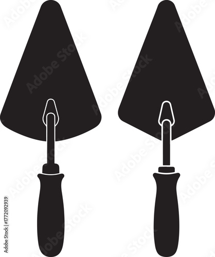 Two trowels in silhouette style