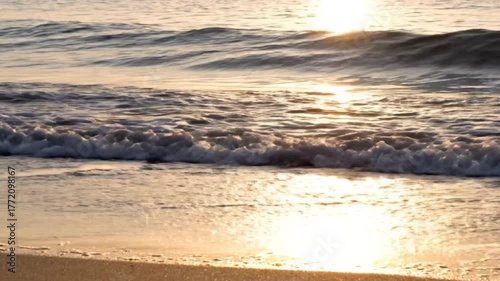 Golden Sunset Reflection on Ocean Waves Crashing on Sandy Beach Tranquil Scene with Warm Light and Soft Focus Shot for Adobe Stock Photo