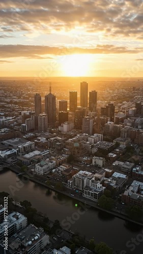 Golden Hour Aerial View Of Melbourne City Skyline And Yarra River