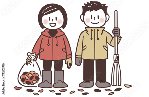 Two junior high school students smiling after cleaning fallen leaves / 落ち葉掃除を終えた中学生の男女