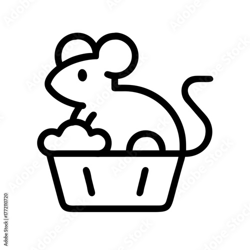 A cute mouse sitting in a basket