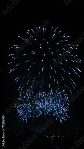 Night Sky Blue Fireworks Bursting Brightly Sparking Festive Celebration