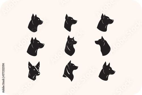 Collection of black dog head silhouettes in profile view
